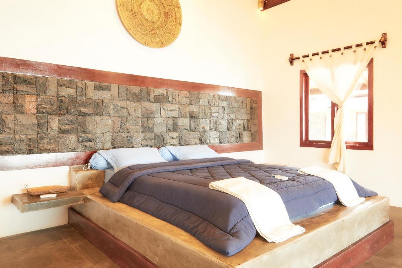 Puri Asu Resort Palau Asu Habitación foto